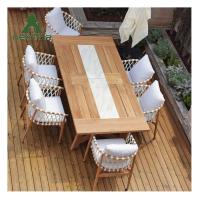 China Durable Simple Patio Furniture Garden Table And Chairs Teak Outdoor Dining Set factory