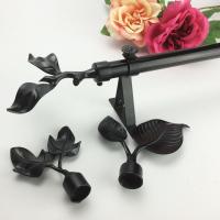 China Matte Black Stainless Steel Leaf Pipe Curtain Rods for sale