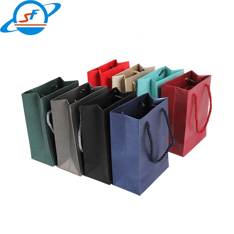 China New Custom Print Logo Gift High Quality Paper Bags Luxury Paper Shopping Bag With Ribbon Handle factory