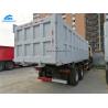 China 50 Tons 23.5m3 Sinotruk Dump Truck With Crane factory