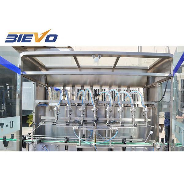 Quality OGZ-2 Electric 4 Heads 20000bph Automatic Edible Oil Filling Machine for sale