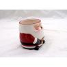 China Fashionable 3D Ceramic Mug Handmade Slip Casting Santa Face Mugs For Drinking factory