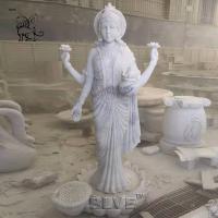 China Lakshmi Marble Statues White Stone Laxmi Sculpture Hindu God Fortune Goddess Indian Religious Hand Carved factory