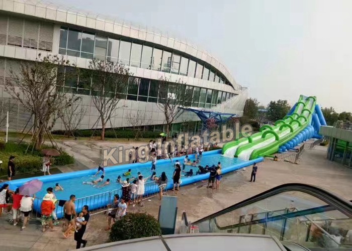 China Customized Giant Green Inflatable City Water Slide , Slip N Slide The City factory