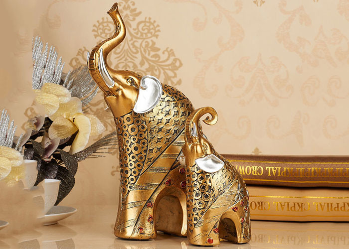China Animal Resin Home Decorations Crafts Gold Color Elephant Figurine Statue factory