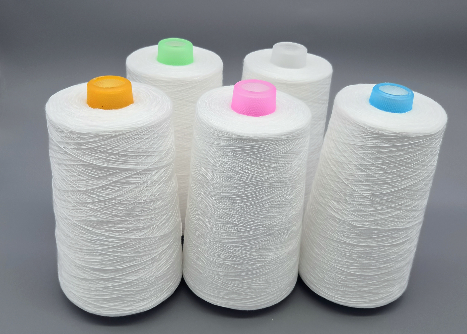 China Paper Cone Raw White 502 Ring Spun Polyester Yarn Dyeing Sewing Thread factory