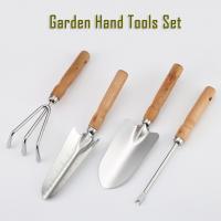 China 4 Piece Stainless Steel Garden Hand Tools Kit With Wooden Handle factory