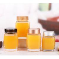 China 180ml 500ml 700ml Round Glass Cream Honey Jar with Round Shape and Glass Material for sale