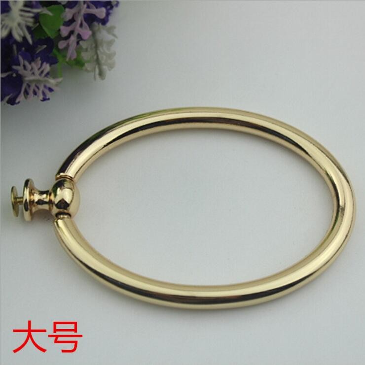 China Unique fashion handbag hardware light gold metal circle handle for tote bag factory