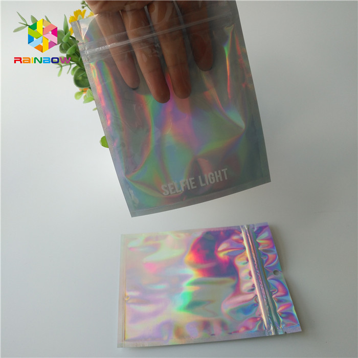 China Hologram Zipper Customized Paper Bags Holographic Stand Up CMYK For Cosmetics factory