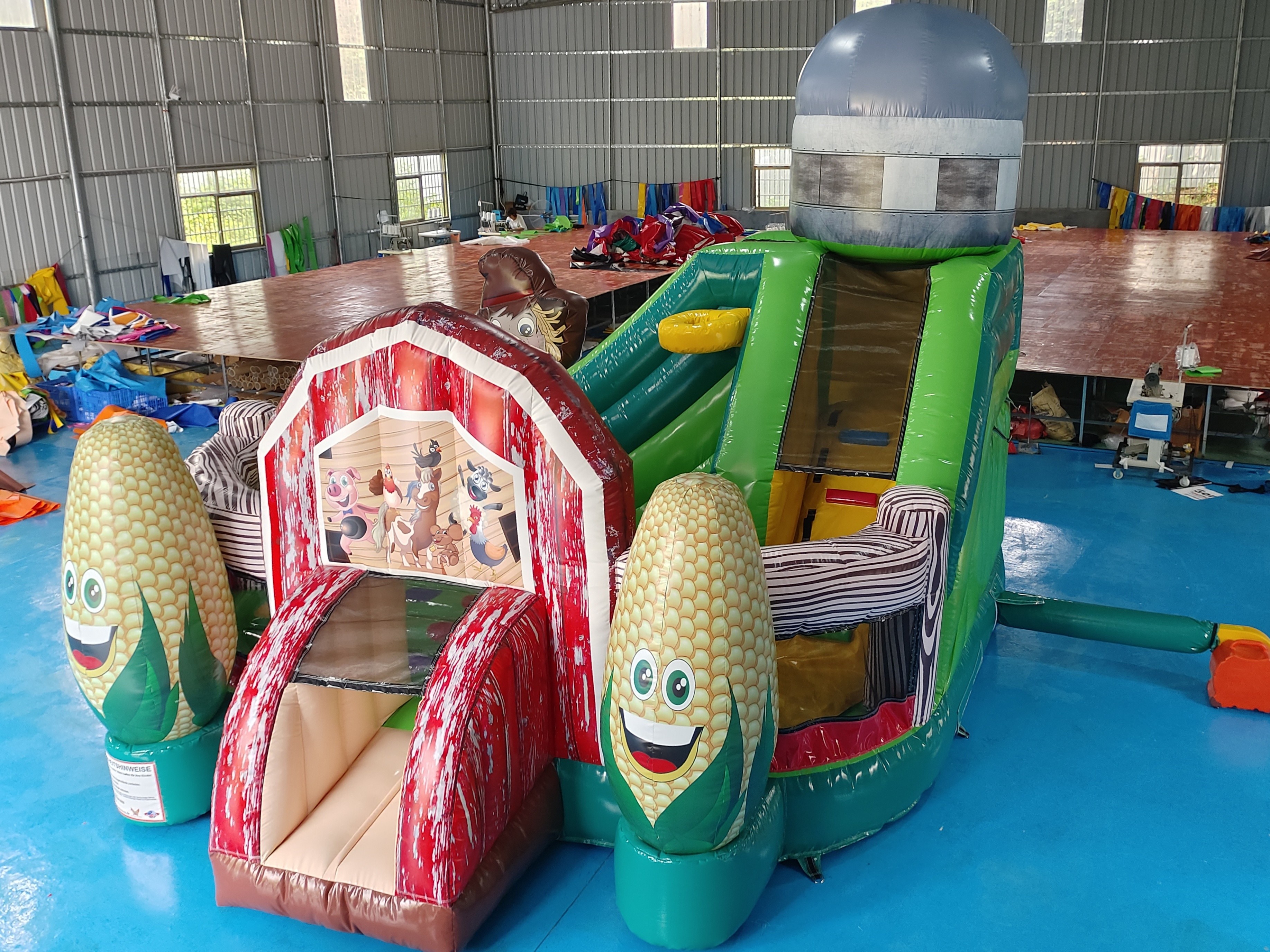 China Digital Printing Inflatable Combo Funny Infant Playground Corn Farm Theme Inflatable Bouncy House With Slide For Kids factory