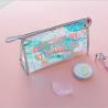 China Waterproof Portable Toiletry Travel TPU Holographic Cosmetic Bag factory