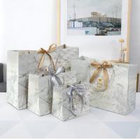 China Marble Pattern Cardboard Gift Bags Thicken Paper Card Ribbon Hand Shopping Bag Reusable for sale