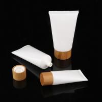 China wholesale empty 30ml plastic soft cosmetic tube, 60ml plastic white cream tube with bamboo cap, empty PET soft tube factory