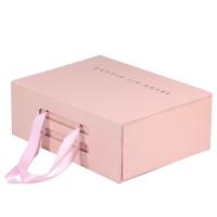 China Foldable Pink Magnetic Closure Gift Box With Ribbon Handle Premium Glossy Finish factory