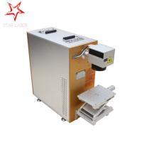 China IPG Auto Electrical Portable Laser Etching Machine For Plastic Yellow Color factory