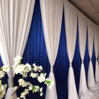 China Hot Sale Wedding Backdrop Blue White Double Drape Cross Valance Luxury Wedding Decoration Backdrop factory