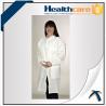 China Long Sleeve PP Disposable Lab Coats Medical Gowns Fluid Resistant Single Use factory