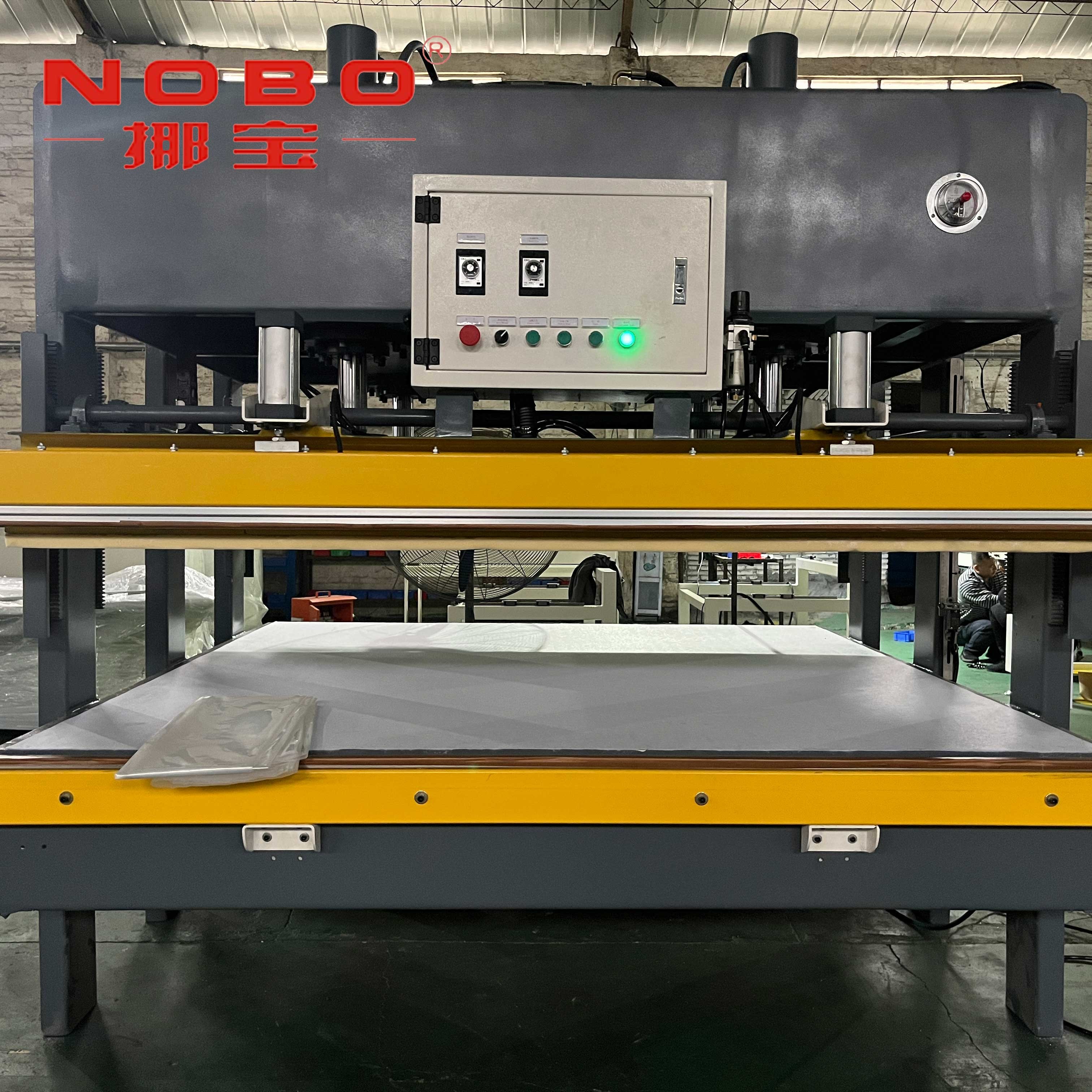 China Nobo 7.5kw Mattress Compression Machine Spring Mattress Roll Packing Machine factory