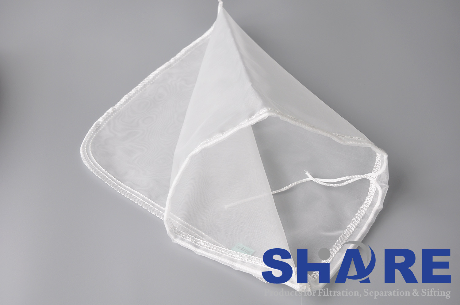 China Drawstring Polyester Monofilament Filter Bag For Retaining Carbon And Zeolite 250 Micron And 800 Micron factory