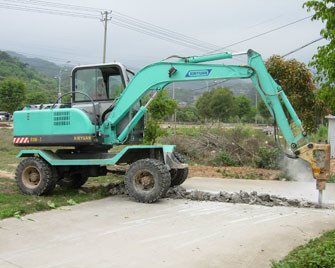 China Four Wheel Drive Wheeled Excavator With Breaker Hammer Light Blue factory