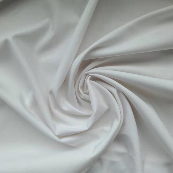 Quality 140-160gsm Polyester Spandex Fabric 150cm Cationic Woven Diamond Dobby for sale