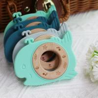 China BPA Free Silicone Baby Teether With Wooden Ring Teething Relief For Babies Durable factory