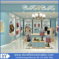 China Custom nice fashion  design wooden lacquer Childrens Clothing Stores display showcase furniture  with good price factory