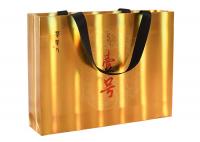 China Custom Printed Luxury Gold Paper Gift Bags Packaging with Embossed LOGO for Sale factory