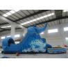China Children Entertainment Large Inflatable Slide Dolphin Boat Inflatable Floating Water Slide factory