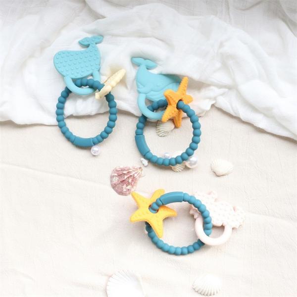 Quality Food Grade Silicone Baby Teether With Non - Toxic Design And Easy Grip Handle for sale
