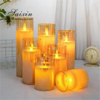 China Hot sale  wedding  decoration real wax flicke moving flame LED pillar candle with glass cups factory