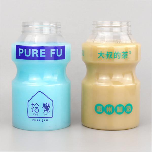 Quality 500ml Plastic PET Bottles Unique Shape Fruit Juice Bottles OEM With Lid for sale