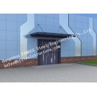 China Automatic Glass Sectional Industrial Garage Doors Steel Buildings Kits Superior Weather Resistance for sale