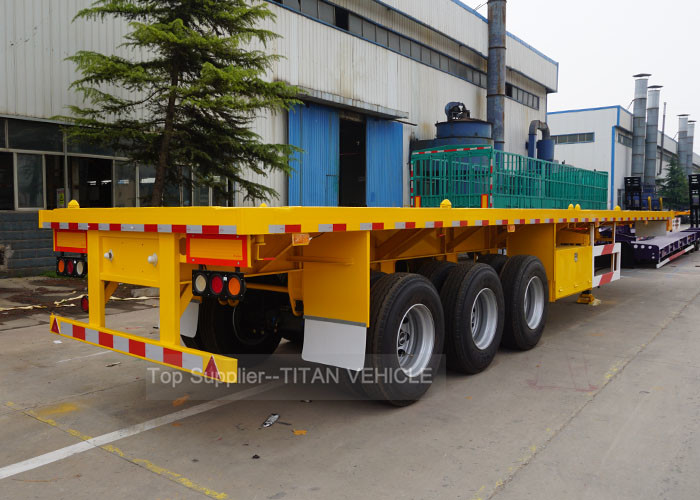 China TITAN 3 Axle flatbed semi trailer , 40ft heavy duty flatbed trailers factory