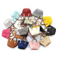 China OEM 35g Brown Mini Purse Keychain , PU Leather Small Coin Pouch Keychain factory