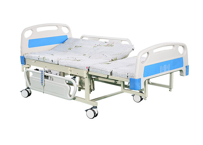 China Patient Side Turning Electric Hospital Bed With Hand Controller For Movements for sale
