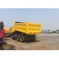 Quality Heavy Duty Sinotruk Howo Tipper Truck 6X4 30 - 40 Tons Ventral Lifting Radial for sale