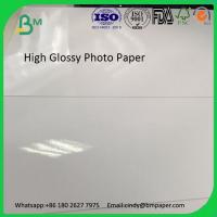 China Waterproof Cheap Cast Coated A4 Glossy Inkjet Photo Paper factory