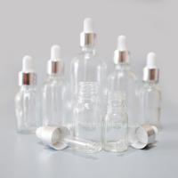 China SXT-05 30ml transparent essential oil Bottles empty glass bottles with button dropper pipette factory