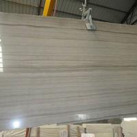 China Hot selling big slab polished wood grain marble tile factory
