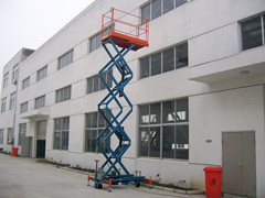Quality 9m Hydraulic Scissor Lift With Motorized Device Electric Lifting Table 450kg for sale