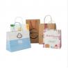 China Color Printed Eco friendly kraft paper Carrying Shopping Bags with handles factory