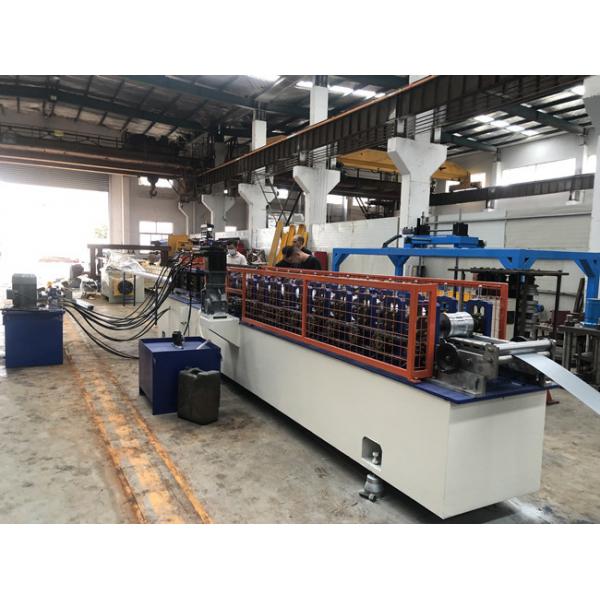 Quality 0.7-1.2mm Thickness Galvanized and the Color painted Perferation Shutter Door Roll Forming Machine for sale