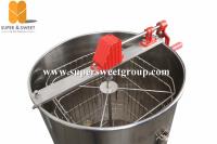 China Manual 4 frames stainless steel honey extractor with honey gate and legs factory