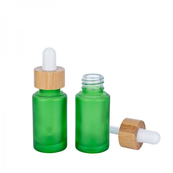 Quality 30ml Frosted Green Glass Dropper Bottles Essential Oil Bottle With Bamboo Dropper for sale