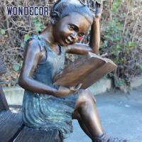 China Custom Life Size A bronze statue of a girl sitting on a bench reading a book factory