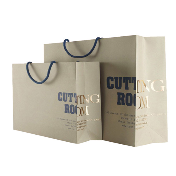 Quality Custom Recycled Brown Paper Merchandise Bags Wholesale With Gold Foil Logo for sale