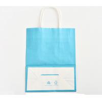 China Blue Color Printed Kraft Paper Bags Customzied Logo With Twisted Paper Handle for sale