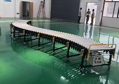 China Zhengzhou Generate Machinery Stainless Steel Flexible Gravity Rolling Conveyor for Sale factory